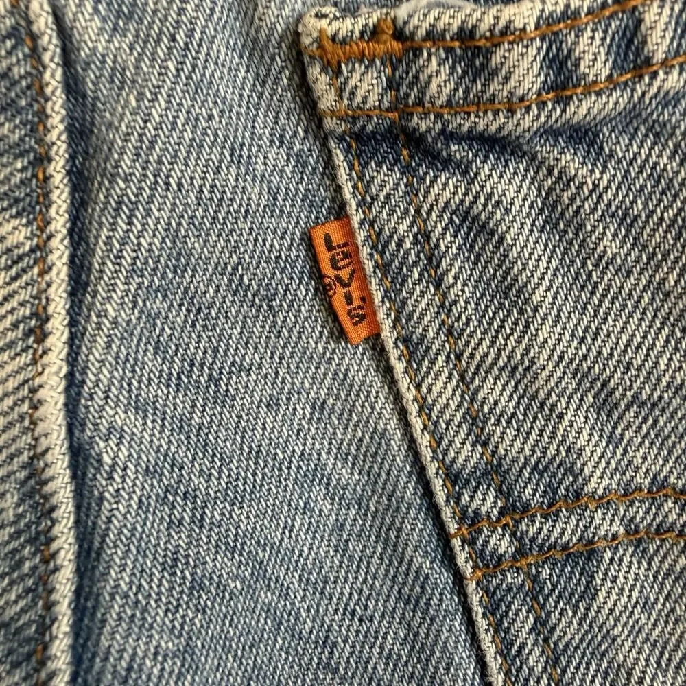 Vintage Levi’s 550 Jeans Men’s 38x30 Relaxed Fit Tapered Leg Light Wash orange